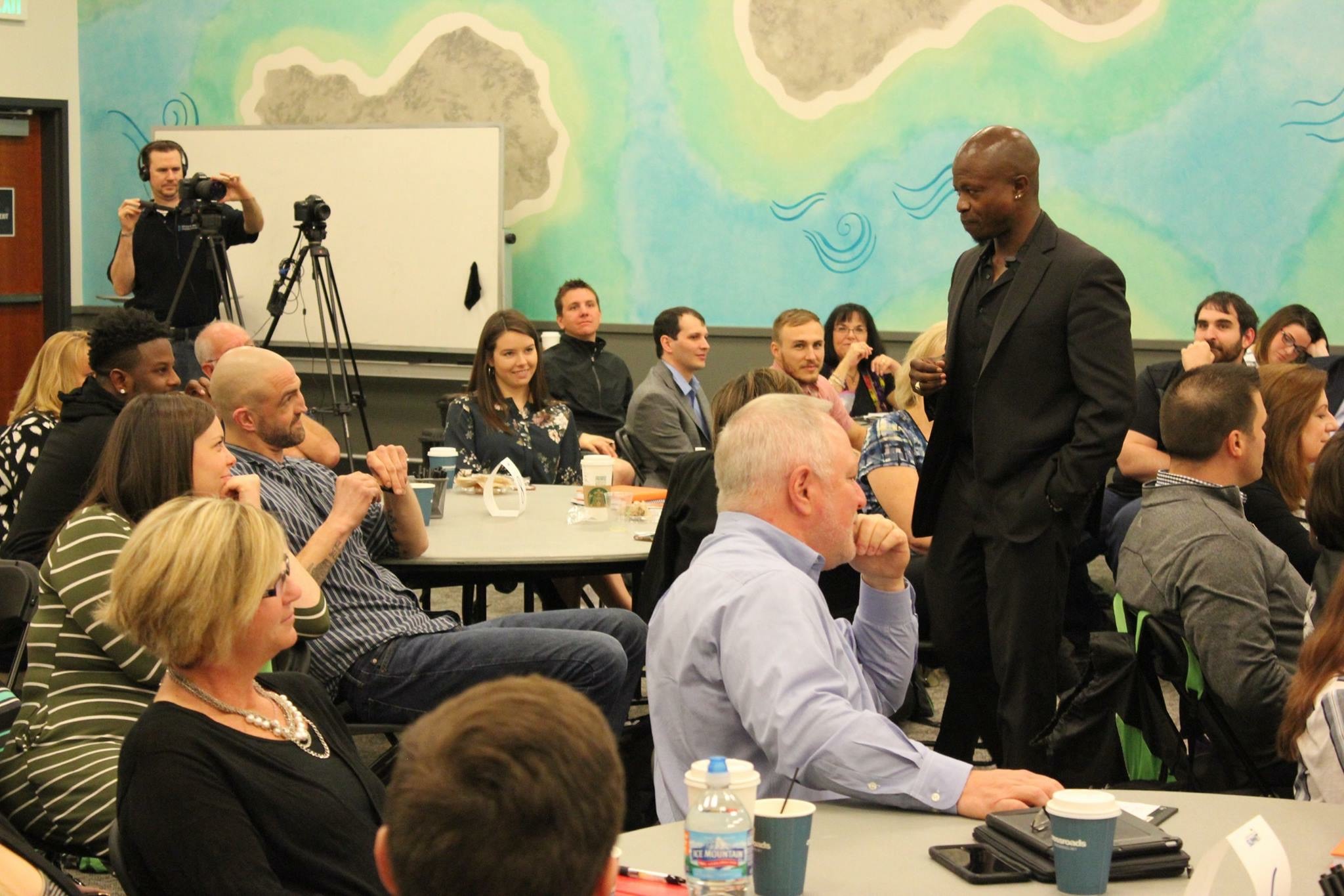 Dr. Karim R. Ellis interacting with training participants