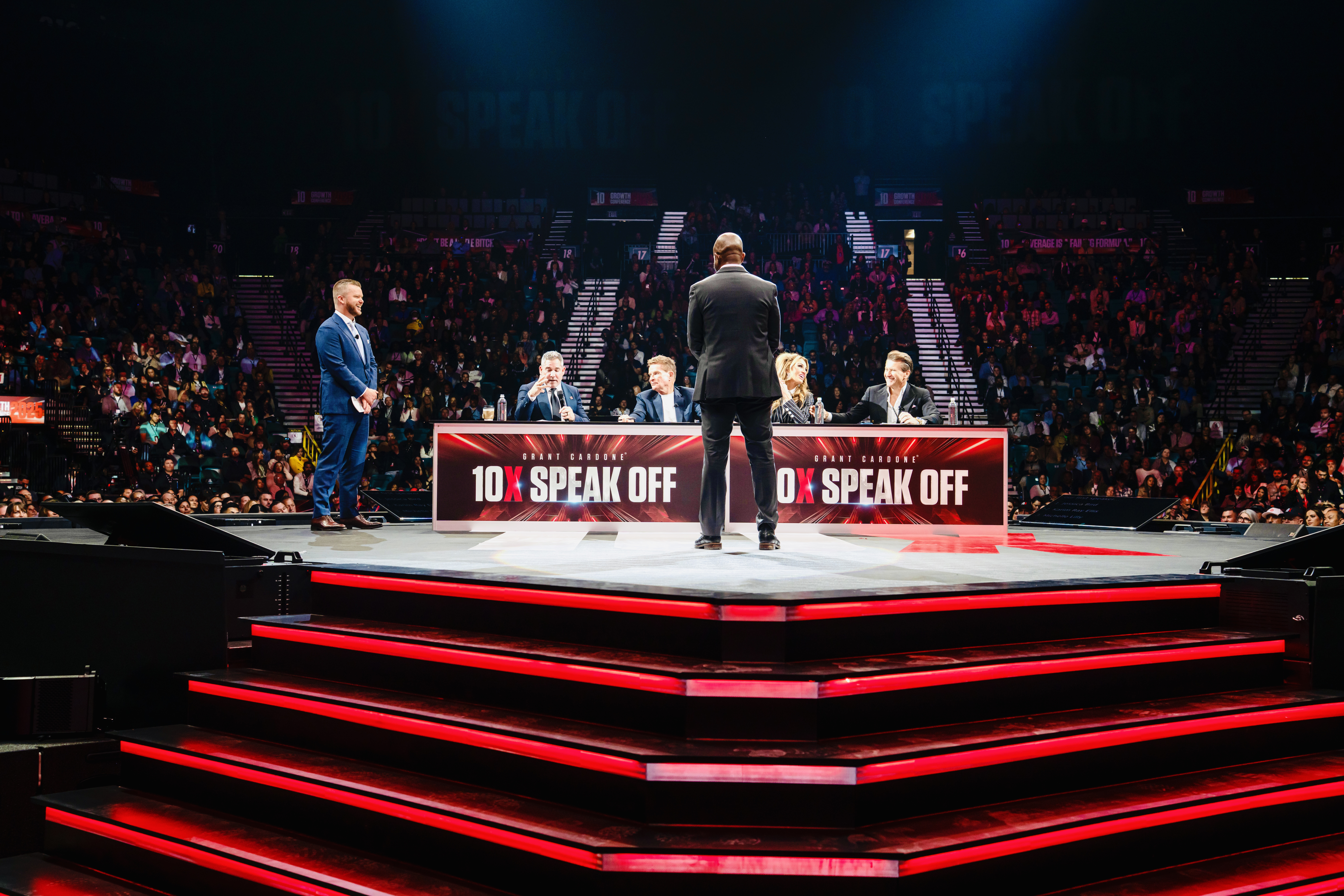Dr. Karim R. Ellis on the 10X Speak Off Season 3 stage facing the judges